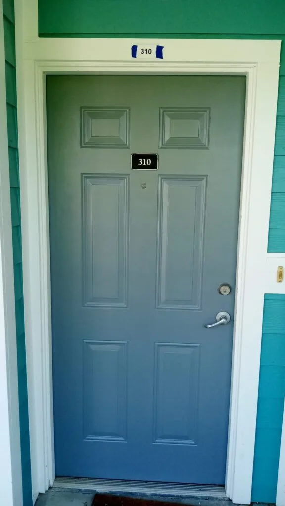 Teal painted door in a Gainesville, FL home