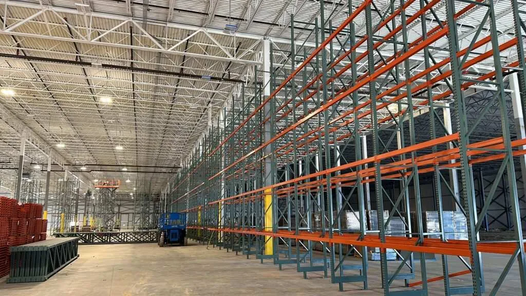 Kemco Industries warehouse interior painted with racking in place in Gainesville, FL