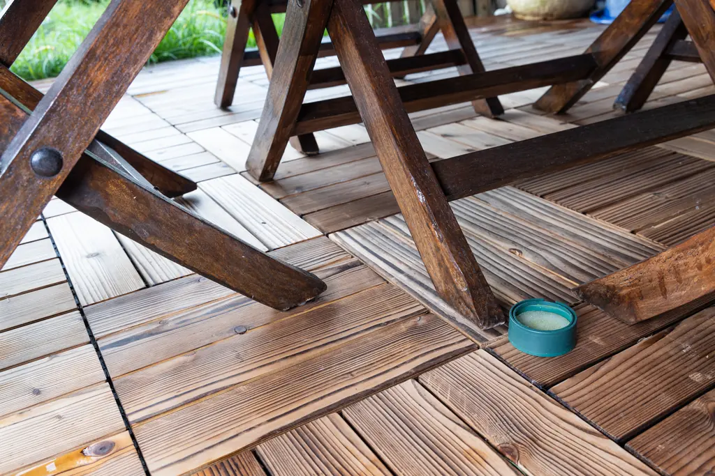 Finished stained wood deck with outdoor seating