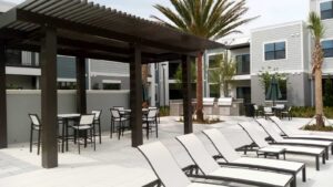 exterior painting of commercial buildings by experienced professionals, swimming pool tanning area