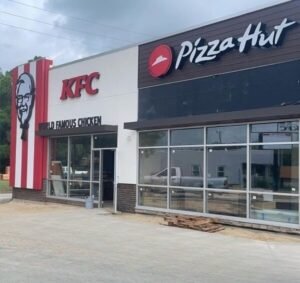 Commercial building exterior painting by experienced professionals to KFC & Pizza Hut