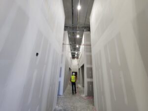 Commercial building interior painting in progress by professional painters