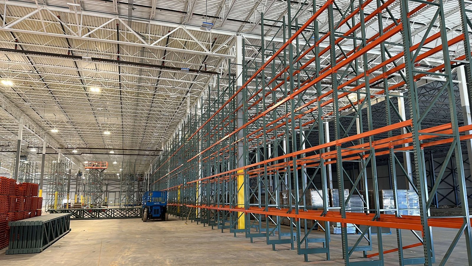 Painting crew working on large commercial building interior